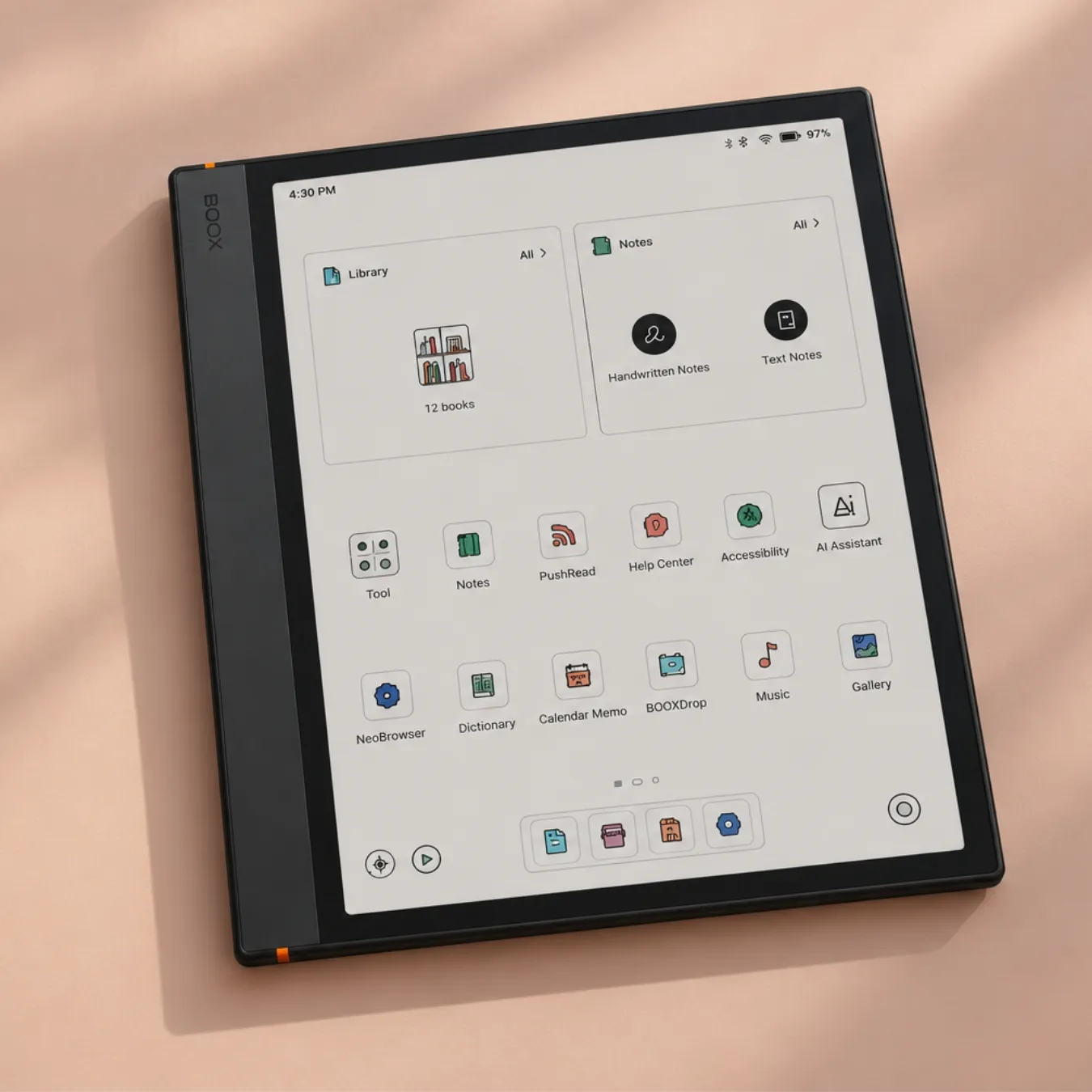 Boox Note Air6 C showing its home screen, on a peach background