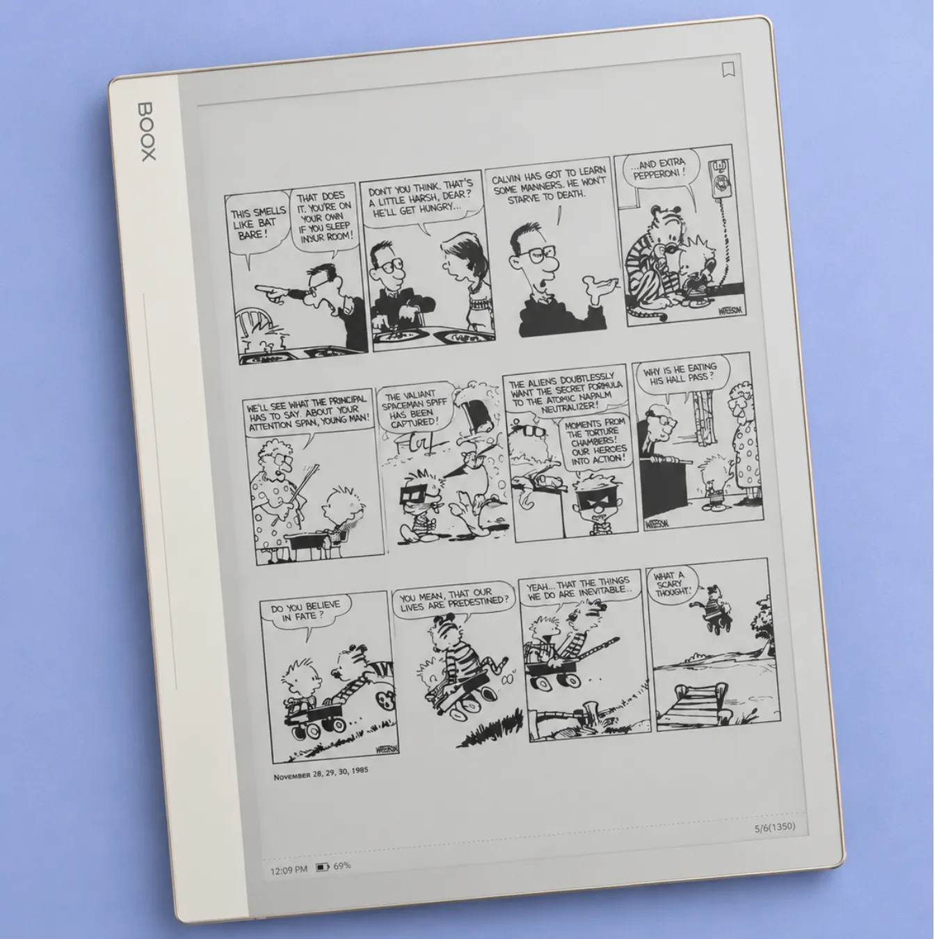 Boox Note Max displaying a comic strip, on a blue background